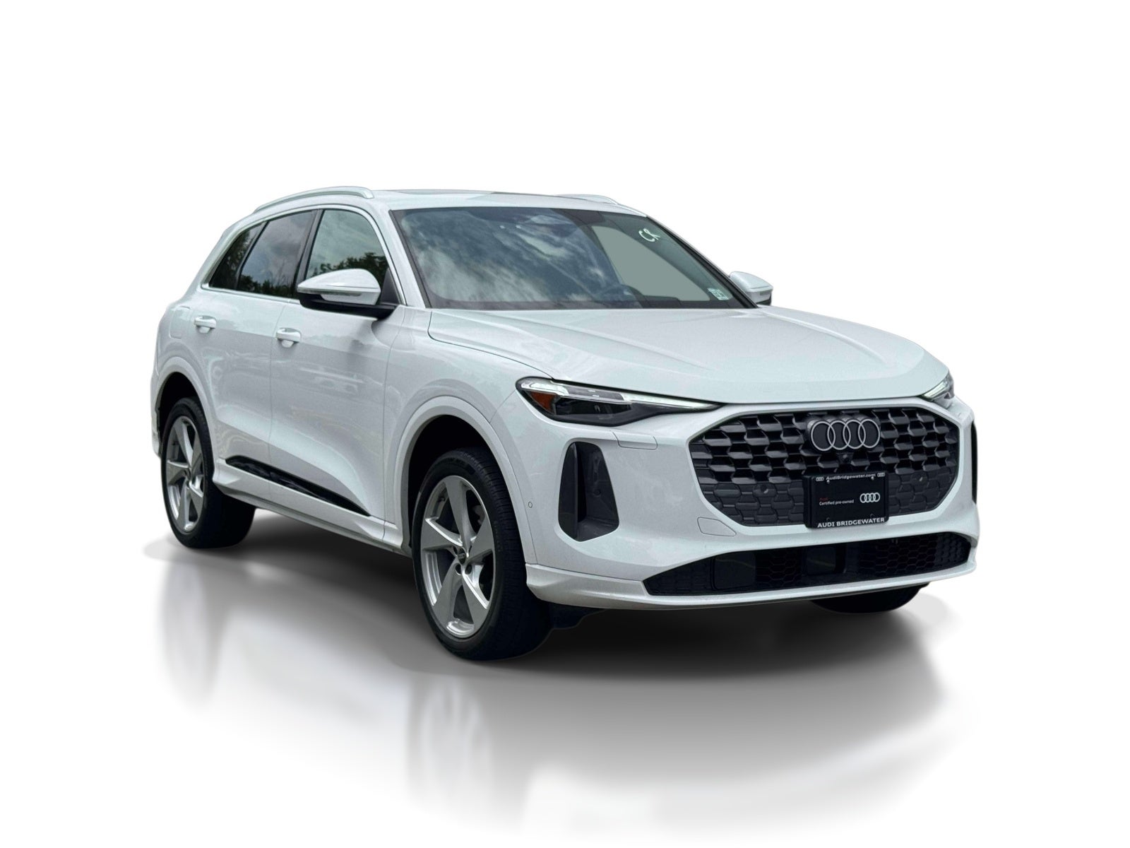 2025 Audi Q5 Premium Plus 2.0 TFSI quattro in White — front three-quarter view